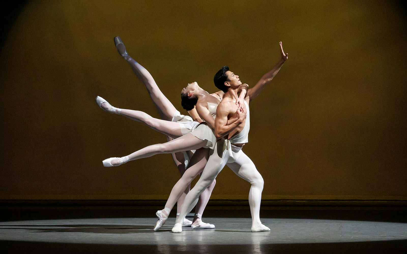 Dancers performing a ballet routine at New York City Ballet.