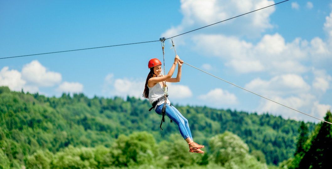Female tourist zipling in Auckland