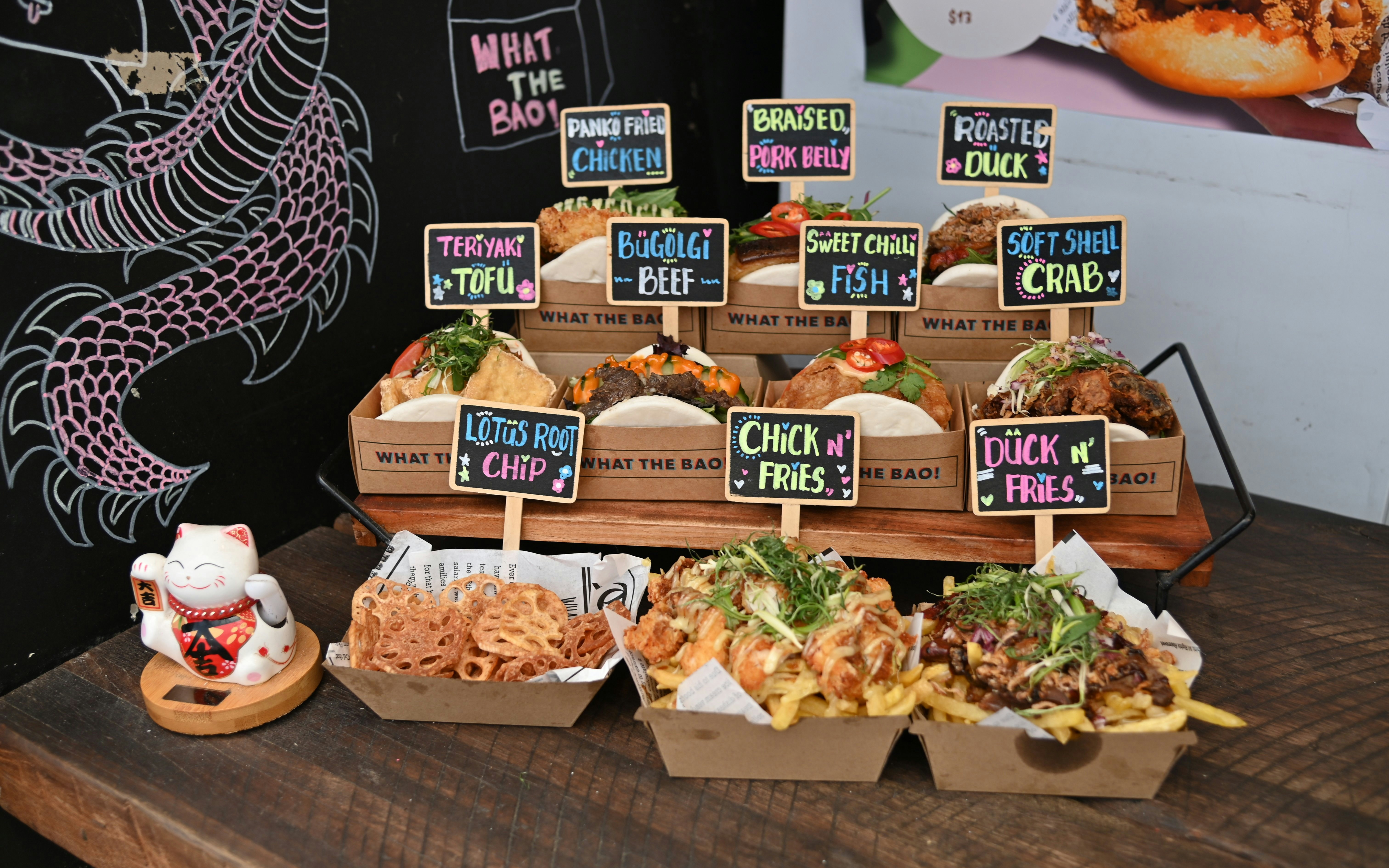 Fremantle Markets food stall with bao buns and fries, featuring teriyaki tofu and bulgogi beef.
