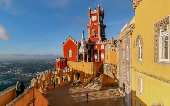 National Palace of Pena in Sintra with colorful towers and scenic views.