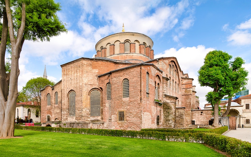 Hagia Irene in the first courtyard of Topkapi Palace, Istanbul, with historic architecture.