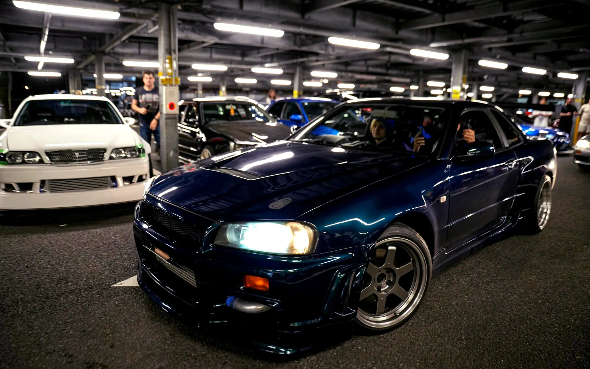 JDM cars parked at a Tokyo night meetup during the JDM Tokyo Car Meetup Night Tour.
