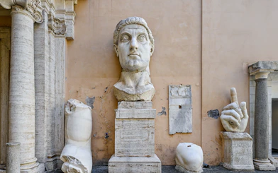 Sculpture fragments of Constantine at Capitoline Museum, Rome, including head and hand.