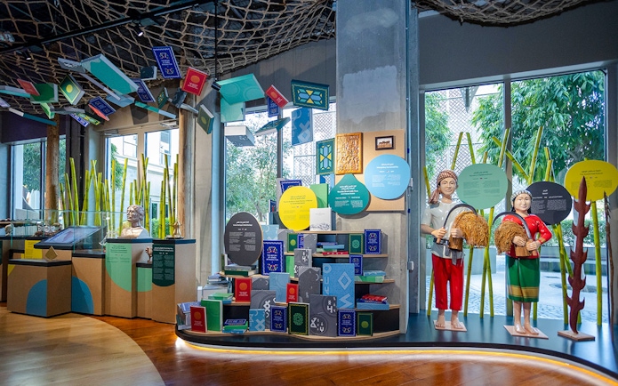 Exhibit featuring cultural artifacts and statues at Expo City Dubai.