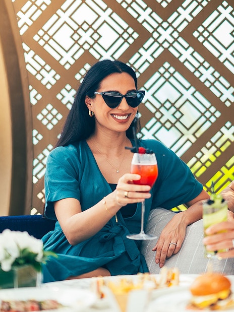 Couple enjoying drinks at Burj Al Arab, Dubai.