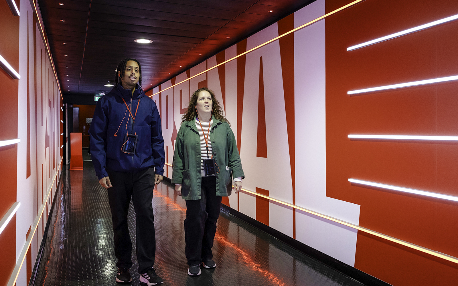 Guests walking through the players tunnel at Emirates Stadium, London.