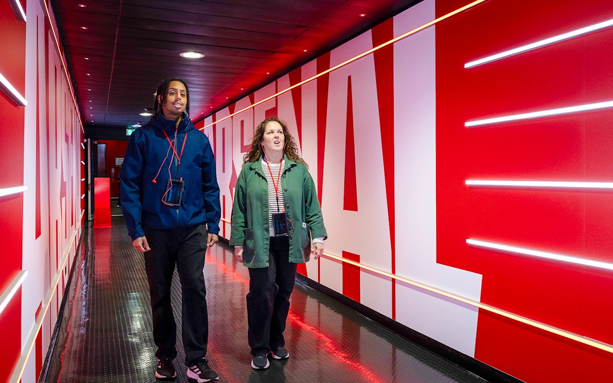 Guests walking through the players tunnel at Emirates Stadium, London.