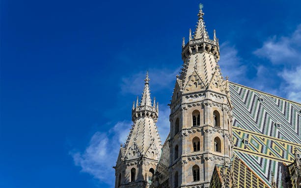 St. Stephen's Cathedral spires and tiled roof in Vienna, Austria.