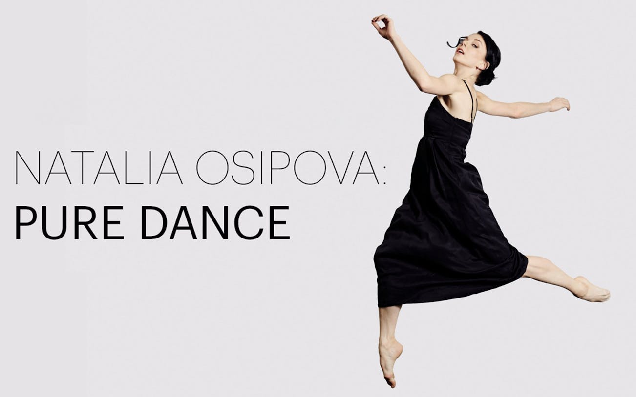 Ballet dancer leaping in black dress for Natalia Osipova: Pure Dance performance.