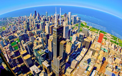 Skyline view from the Skydeck at Willis Tower, Chicago, overlooking Lake Michigan and city skyscrapers.