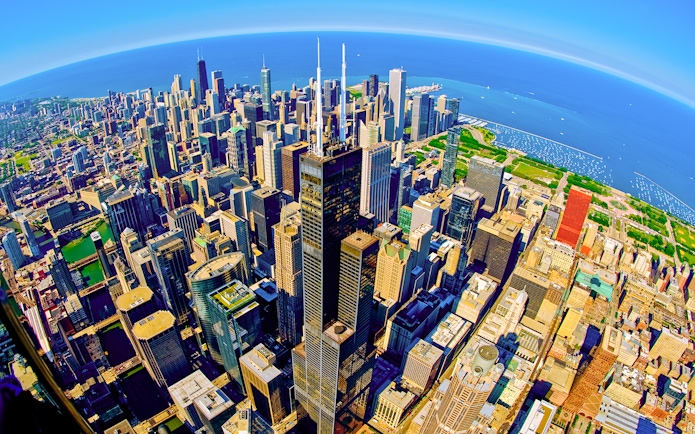 Skyline view from the Skydeck at Willis Tower, Chicago, overlooking Lake Michigan and city skyscrapers.