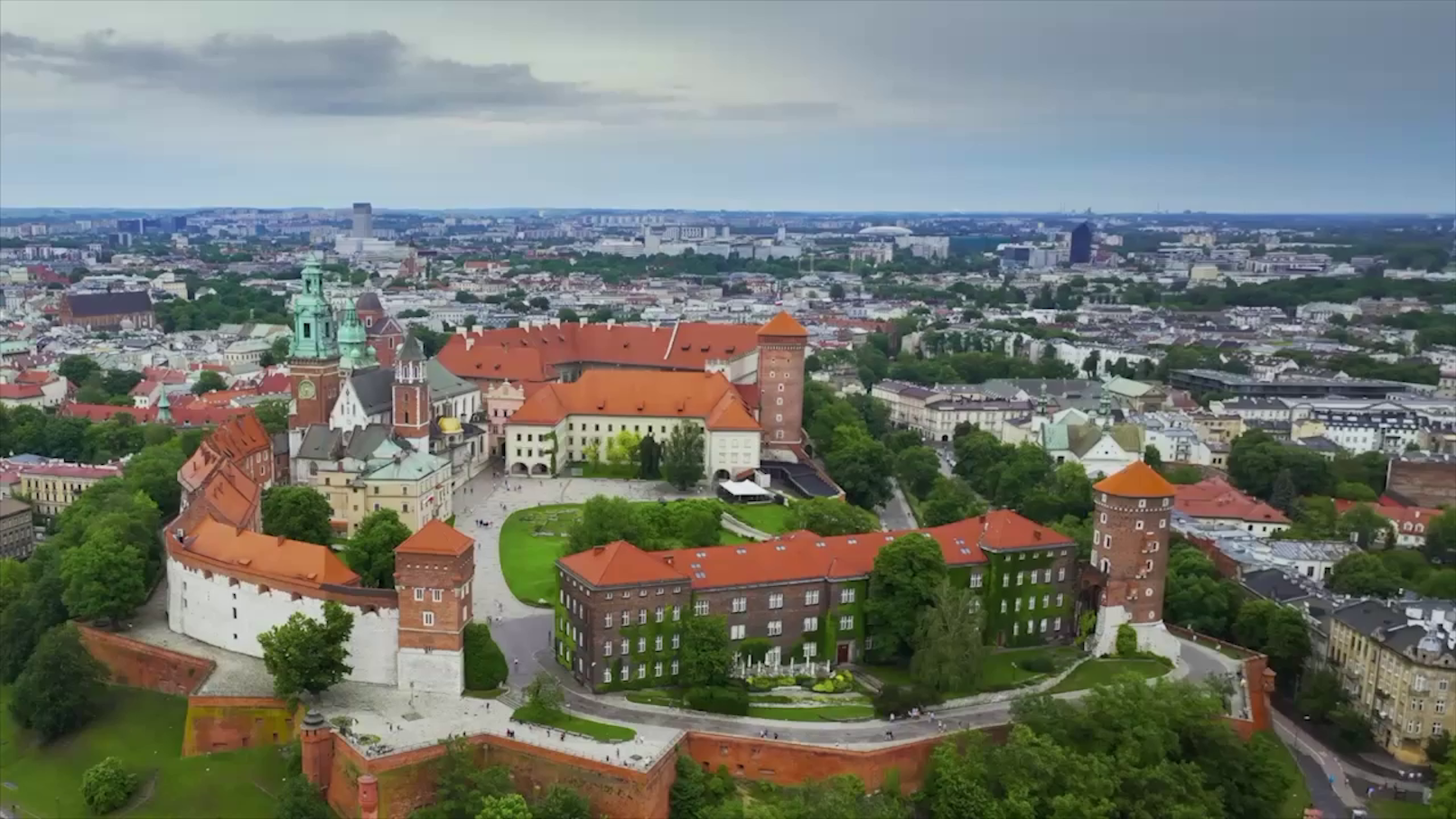 Gondolas on a canal in Venice City with historic buildings in the background.