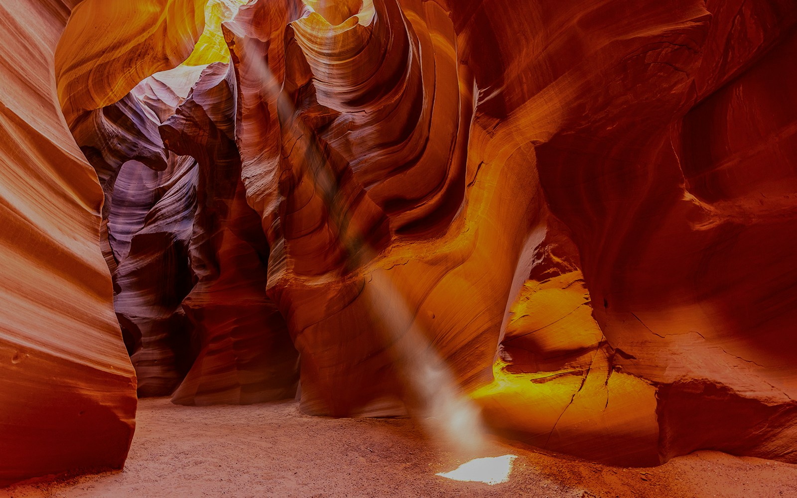 Upper Antelope Canyon sandstone formations with light beams in Arizona.