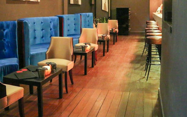 Dining area setup for Dining in the Dark experience in Kuala Lumpur.