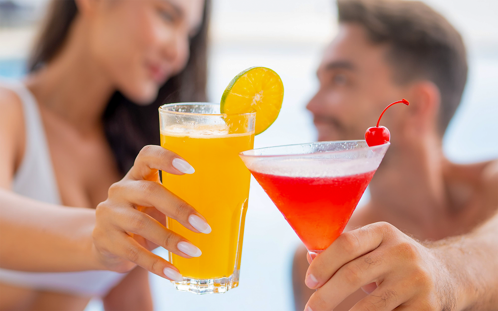 Toasting with cocktails at Flamingo Beach Club.