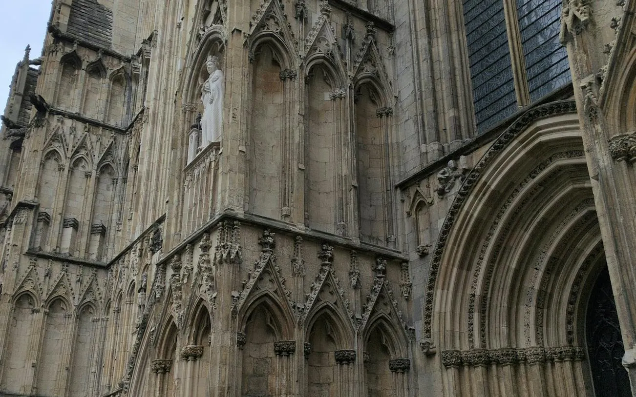 Gothic architecture of York Minster, featuring detailed stone carvings, York.