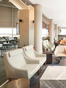 Plaza Premium Lounge seating area in Terminal 1, Leonardo da Vinci-Fiumicino Airport.