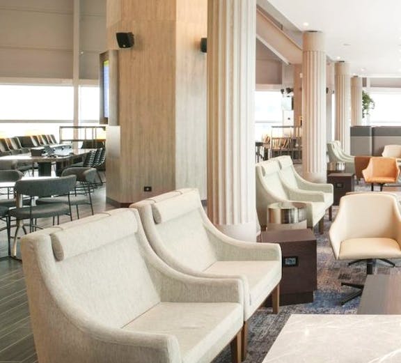 Plaza Premium Lounge seating area in Terminal 1, Leonardo da Vinci-Fiumicino Airport.