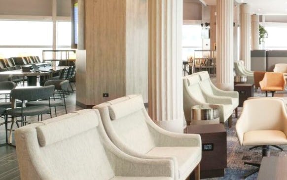 Plaza Premium Lounge seating area in Terminal 1, Leonardo da Vinci-Fiumicino Airport.