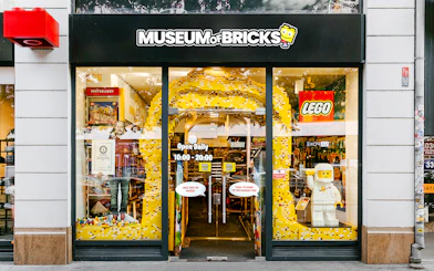 Museum of Bricks entrance with LEGO displays and opening hours.