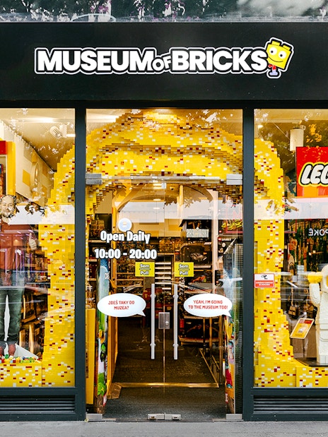 Museum of Bricks entrance with LEGO displays and opening hours.