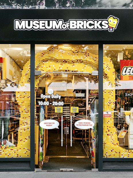 Museum of Bricks entrance with LEGO displays and opening hours.