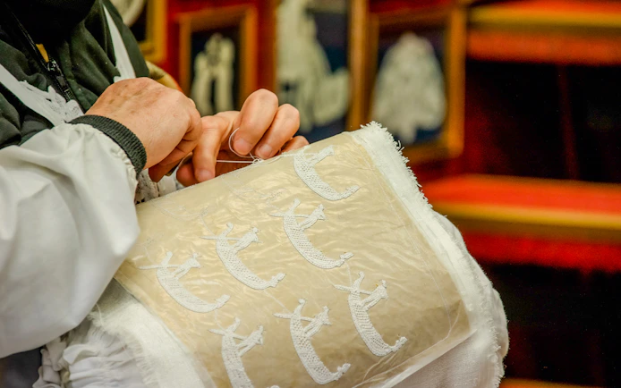 Crafting lace in Murano, Venice during afternoon tour from Punta Sabbioni.