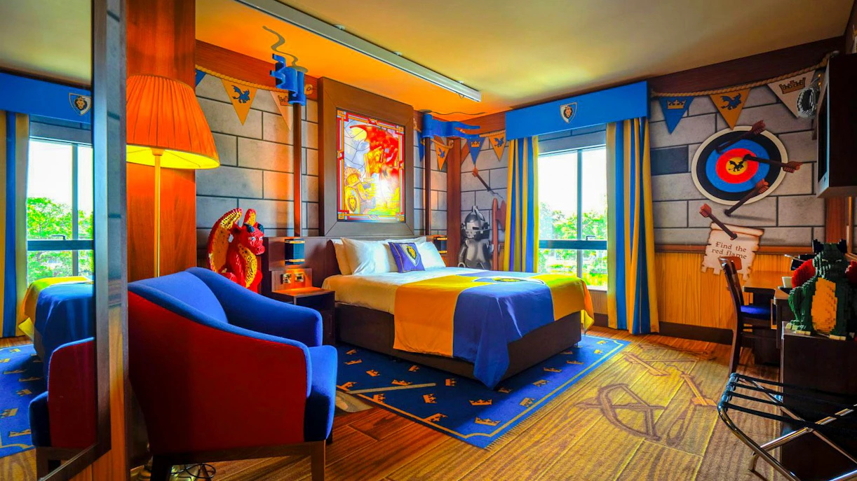 Knight-themed room with colorful decor at Legoland Windsor.