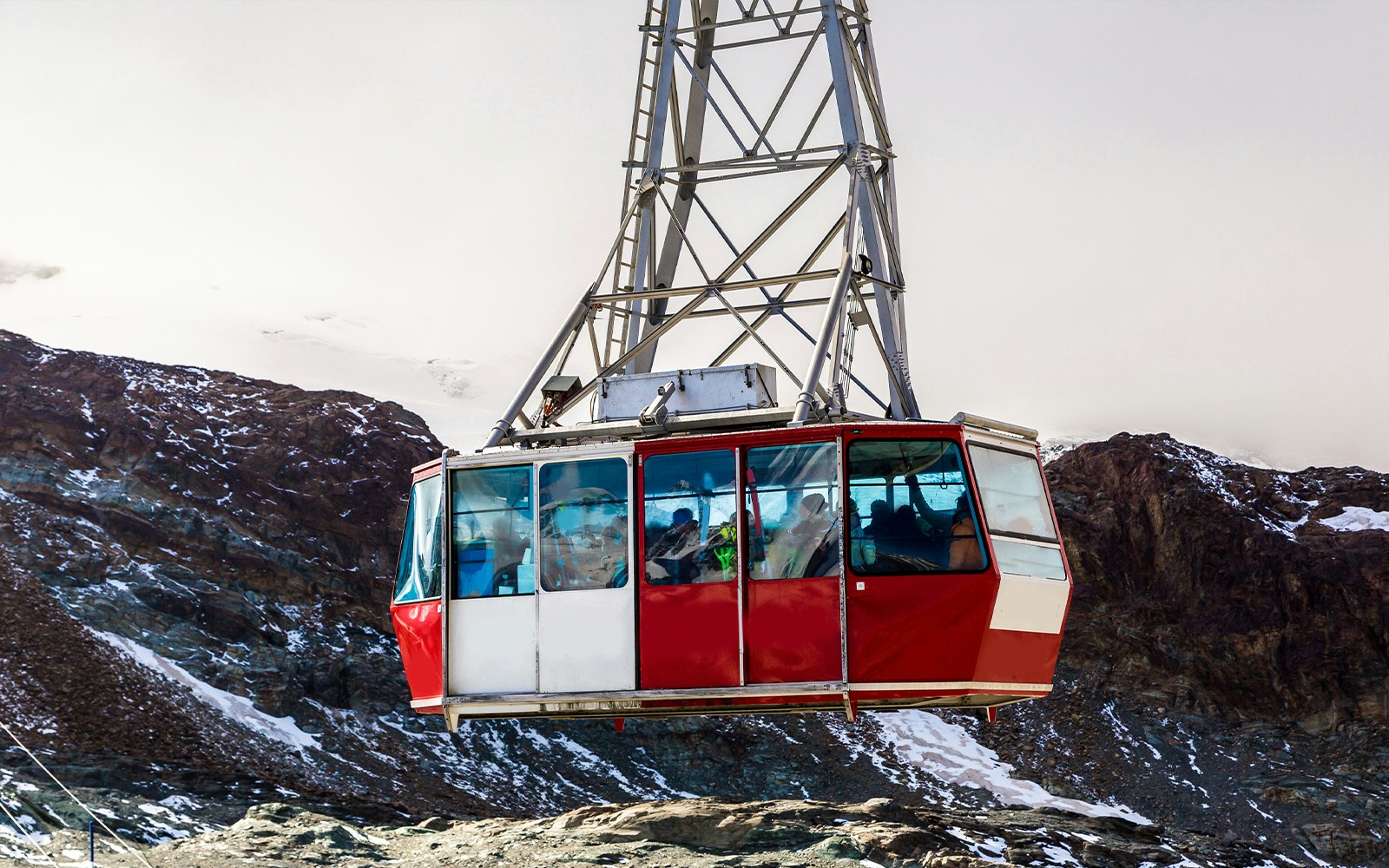 Cable car ascending to Matterhorn Glacier Paradise in the Swiss Alps.