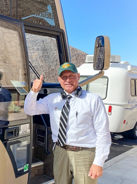 Tour guide by National Park Express bus for Antelope Canyon X and Horseshoe Bend tour.