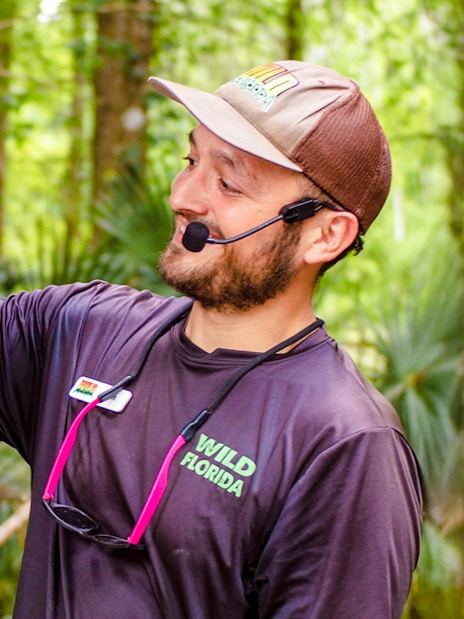 Expert handling snake at Everglades Wildlife Park.