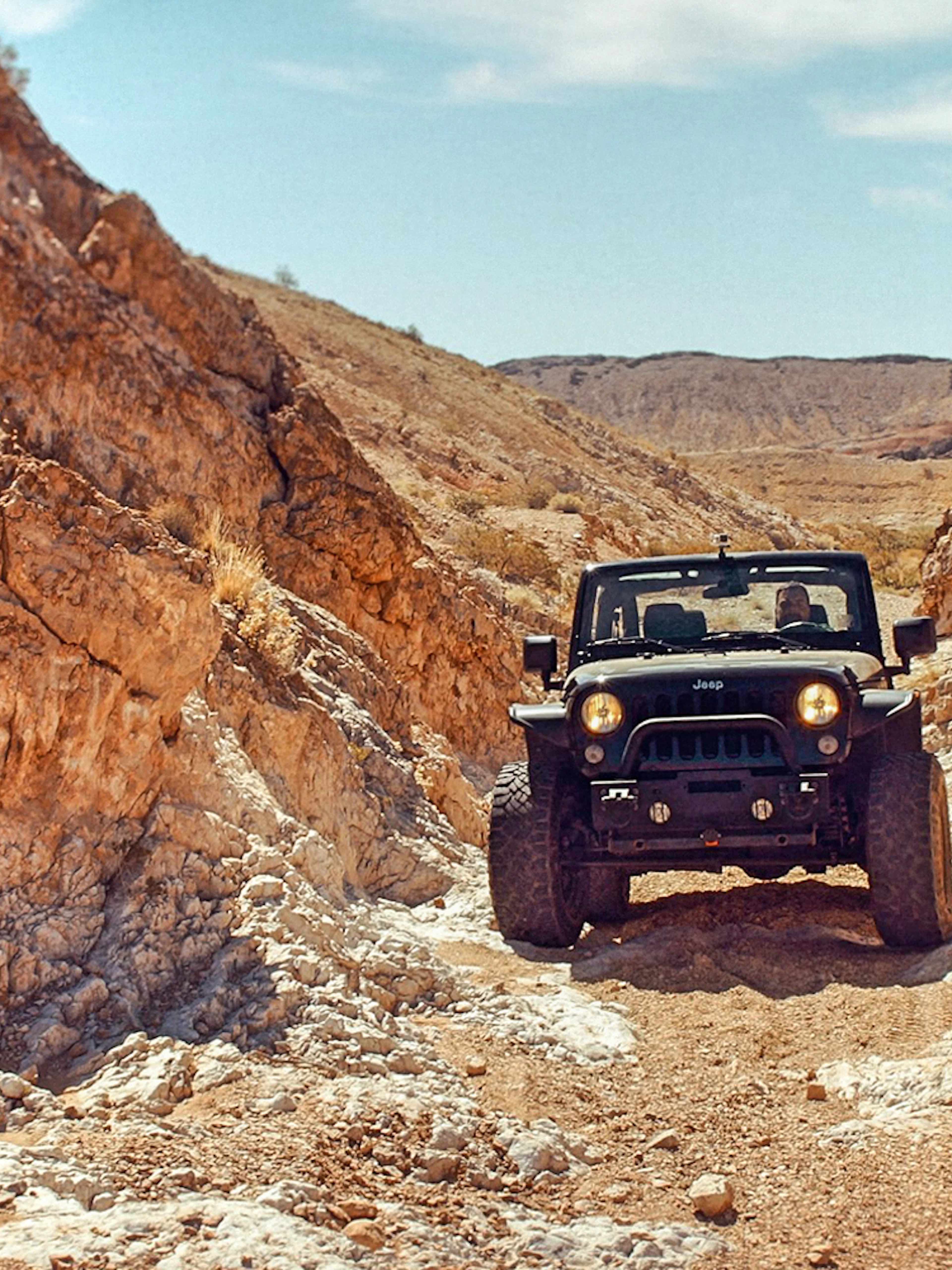 Jeep navigating rocky terrain during Cappadocia safari tour.