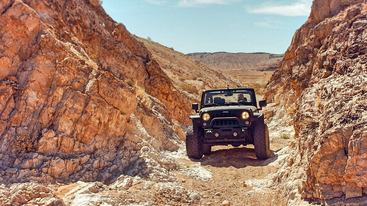 Jeep navigating rocky terrain during Cappadocia safari tour.