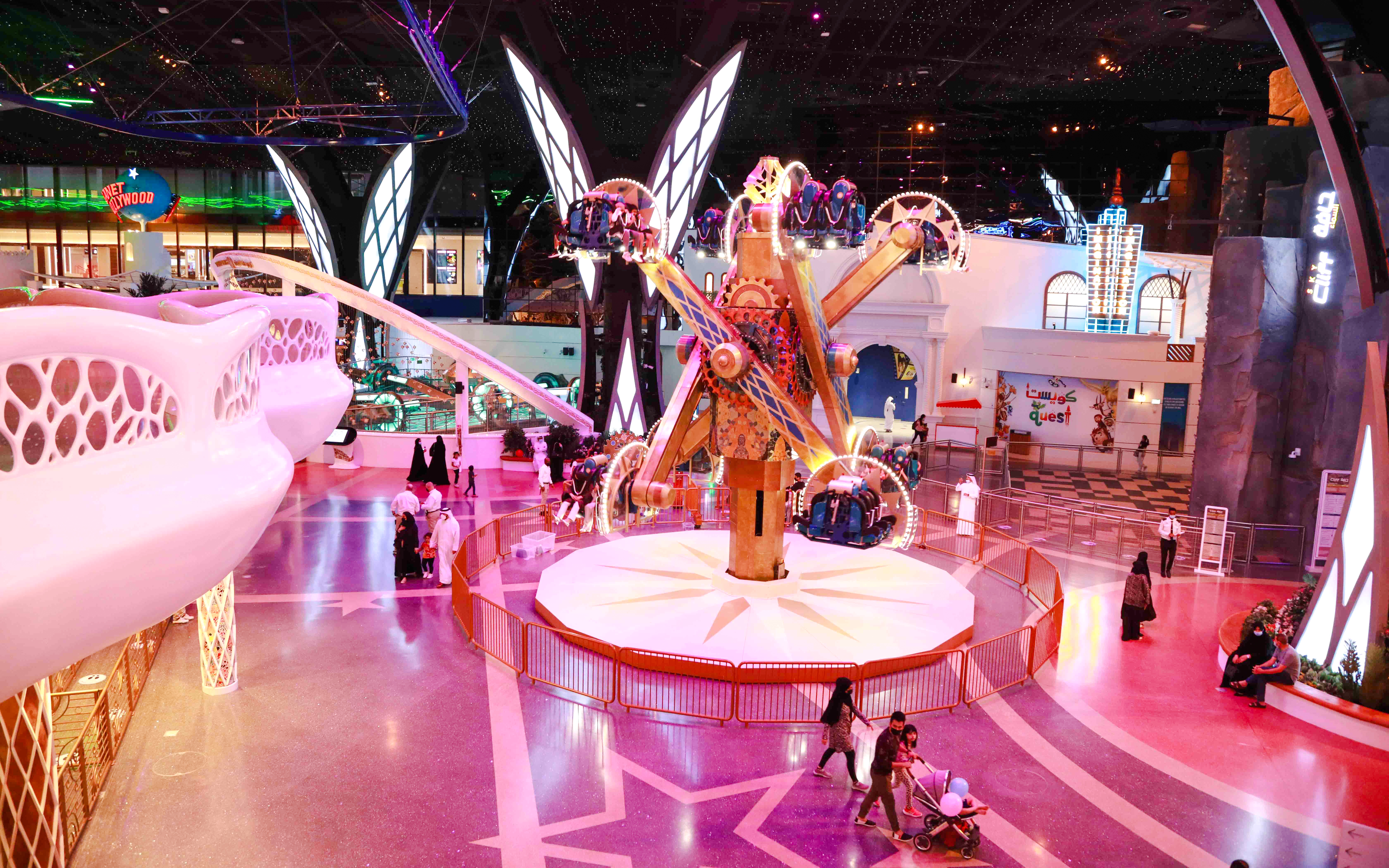 Doha Quest indoor theme park ride with visitors in Qatar.