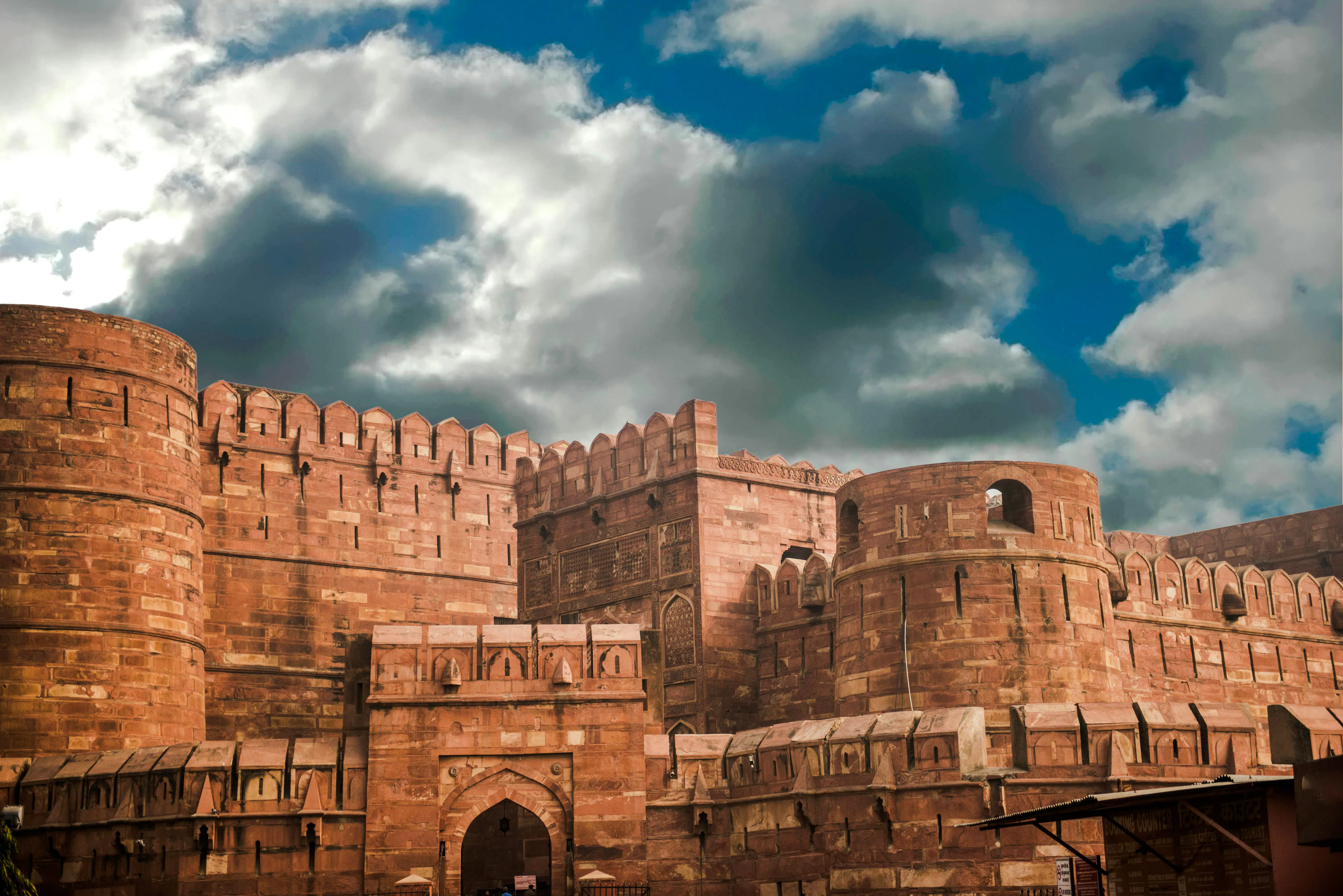 Agra Fort under cloudy sky, part of 3-day Golden Triangle tour.
