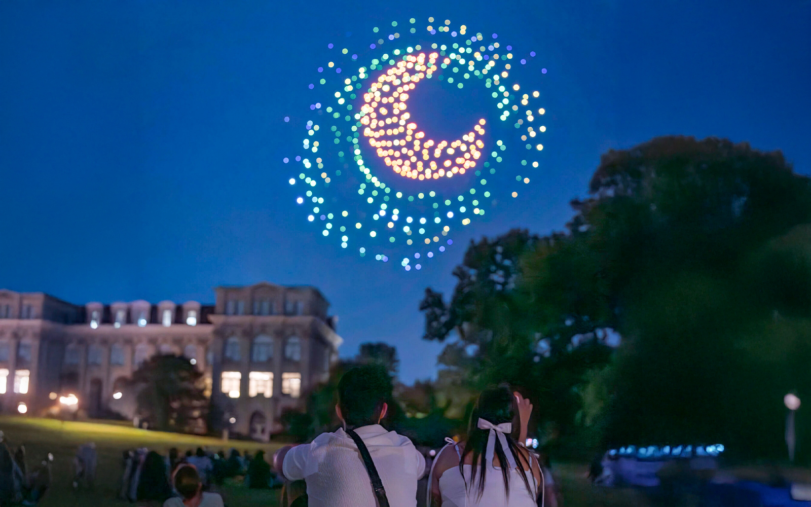 Drone show forming a crescent moon at Van Gogh's Starry Nights event, NYBG.