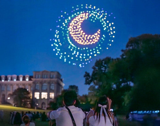 Drone show forming a crescent moon at Van Gogh's Starry Nights event, NYBG.