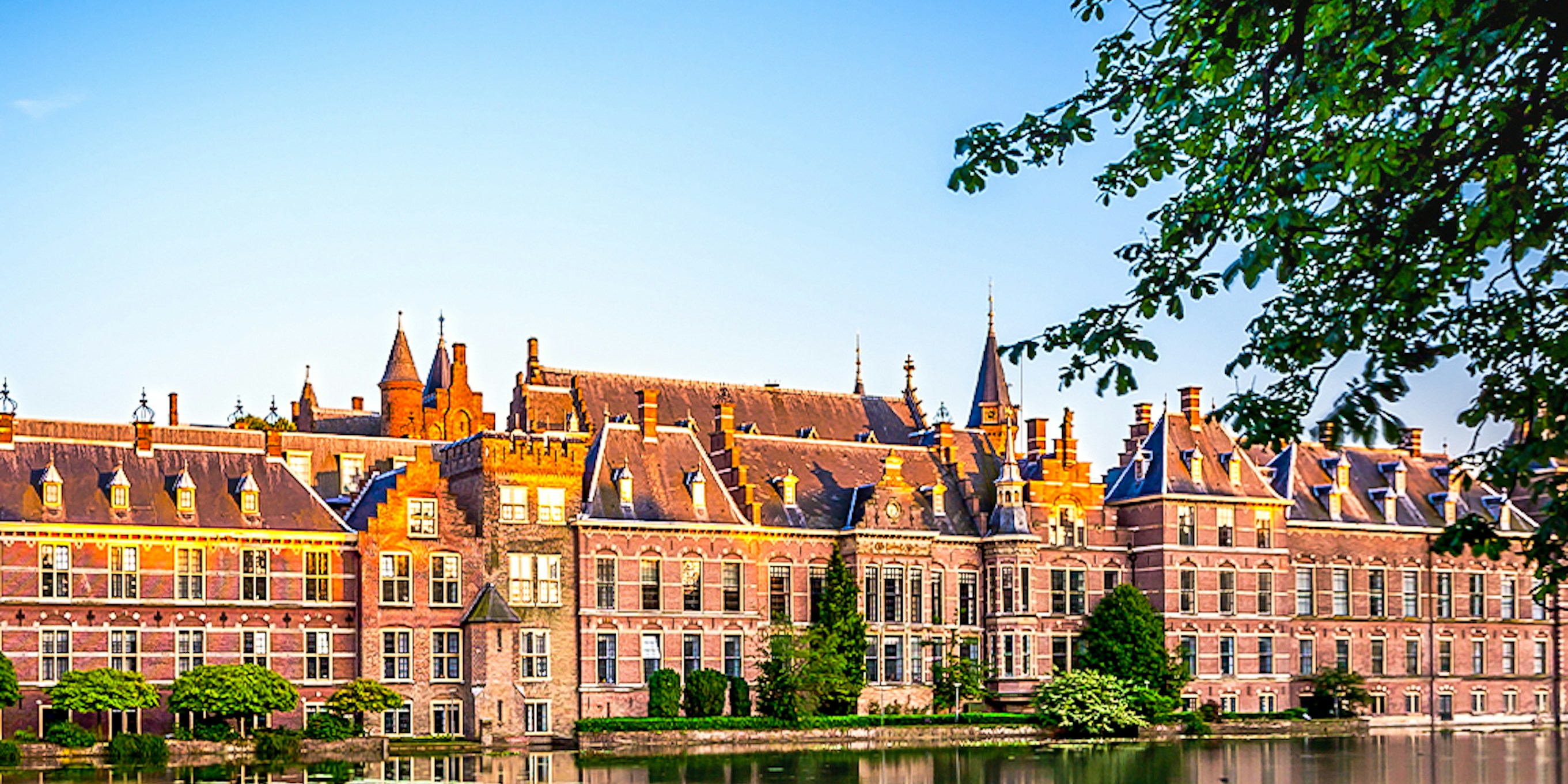 Binnenhof complex reflecting in the Hofvijver pond, The Hague.
