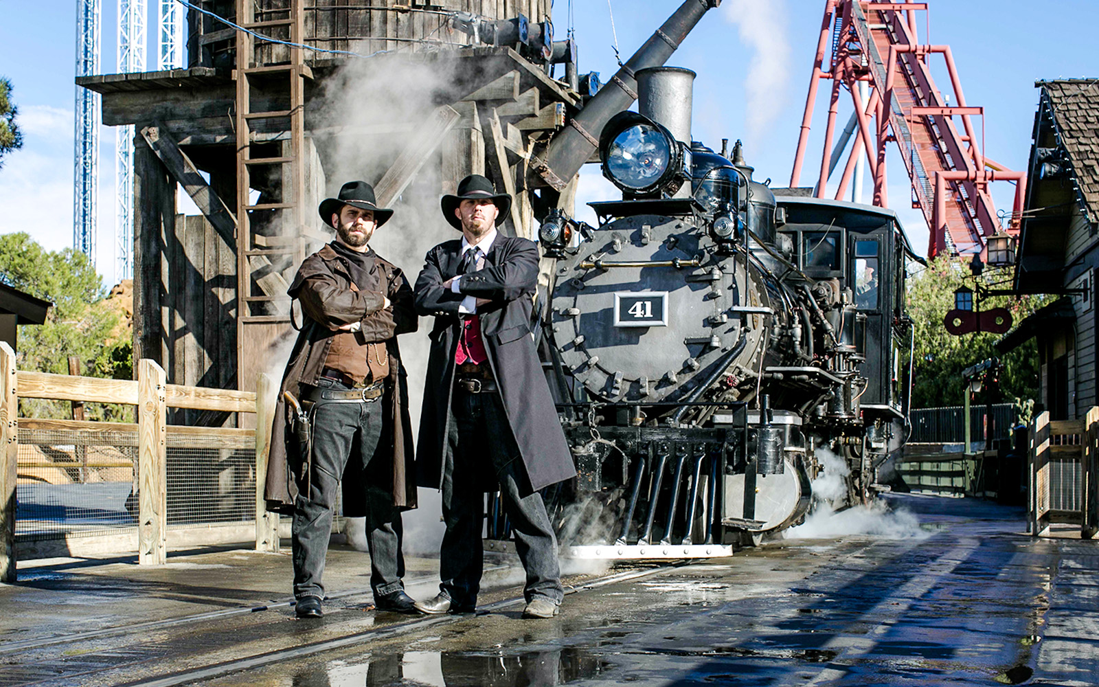 Cowboys in front of a steam train at Ghost Town Alive, Knott's Berry Farm.