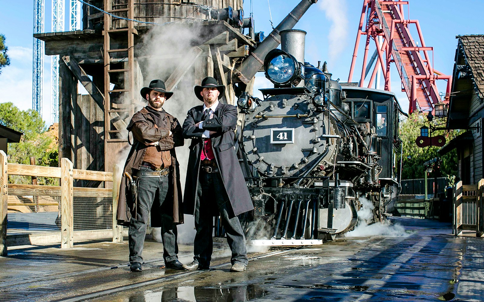 Cowboys in front of a steam train at Ghost Town Alive, Knott's Berry Farm.