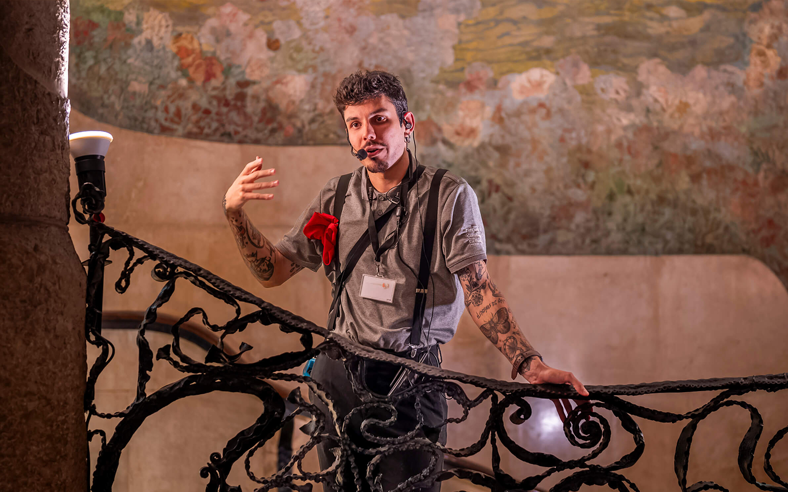 Guide explaining details during La Pedrera Casa Mila night tour in Barcelona.