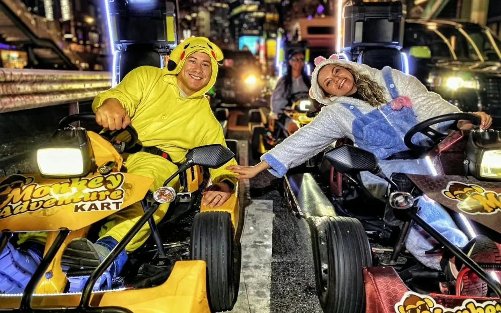 Go-kart riders in costumes at Shibuya Crossing during Tokyo Tower tour by Monkey Kart.