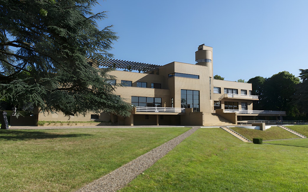 Villa Cavrois modernist architecture in Croix, France, surrounded by greenery.