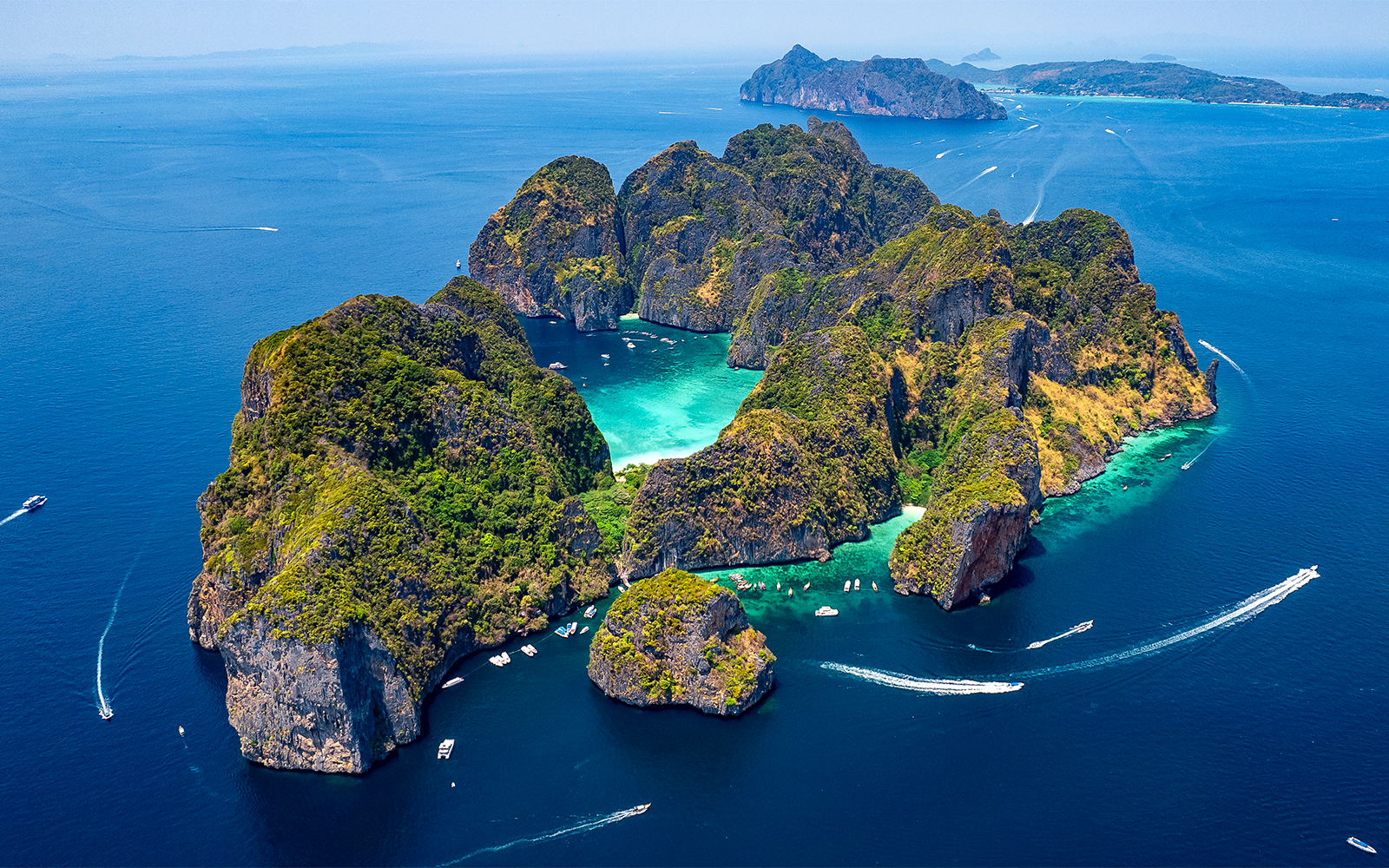 Aerial view of Phi Phi Islands, turquoise waters, lush greenery, Phuket, Thailand