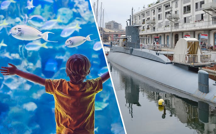 Child watching fish at Aquarium of Genoa and submarine at Galata Maritime Museum.