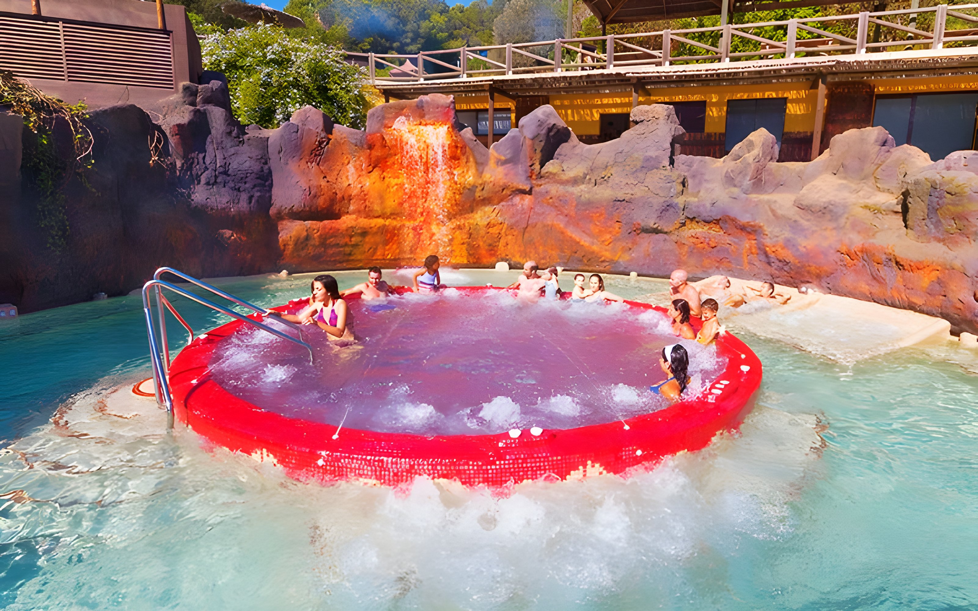 Visitors enjoying the Volcano Jacuzzi at Aquopolis Cullera water park.