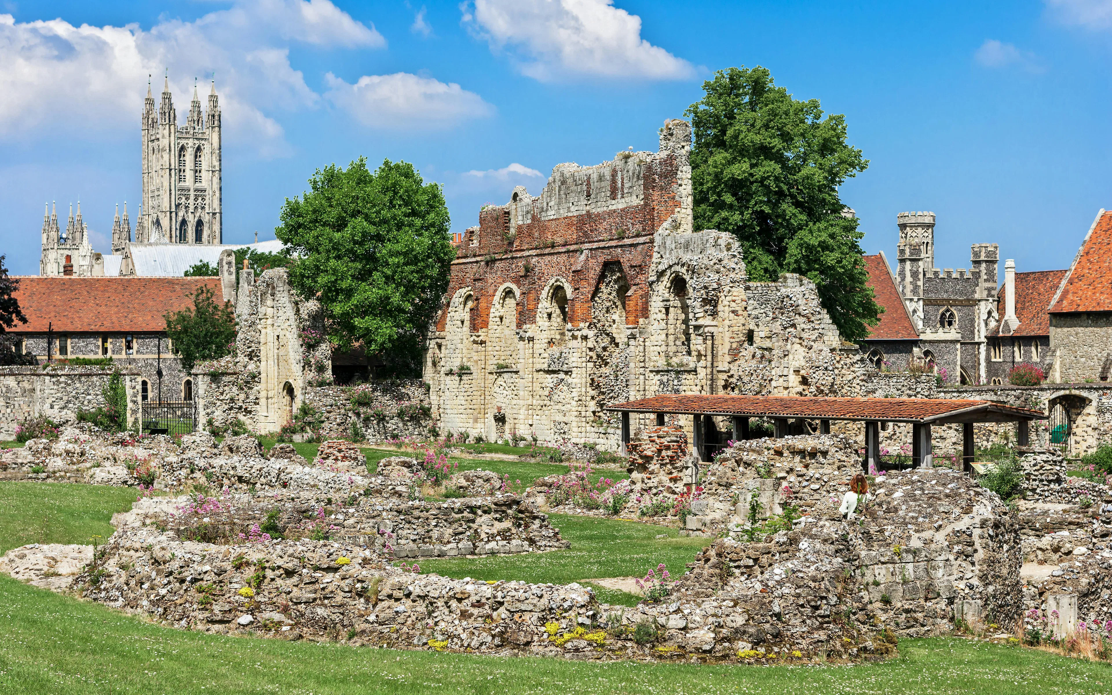 Ruins of St Augustine's Abbey with Canterbury Cathedral in the background, England.