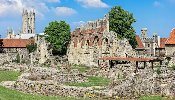 Ruins of St Augustine's Abbey with Canterbury Cathedral in the background, England.