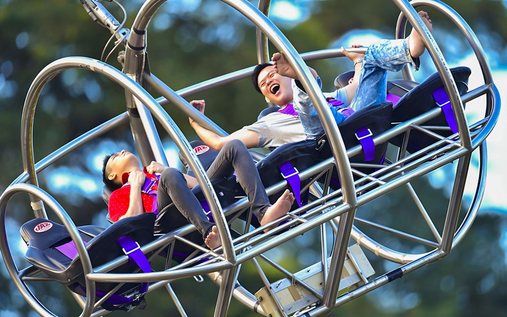 Riders enjoying the Slingshot ride in Singapore.