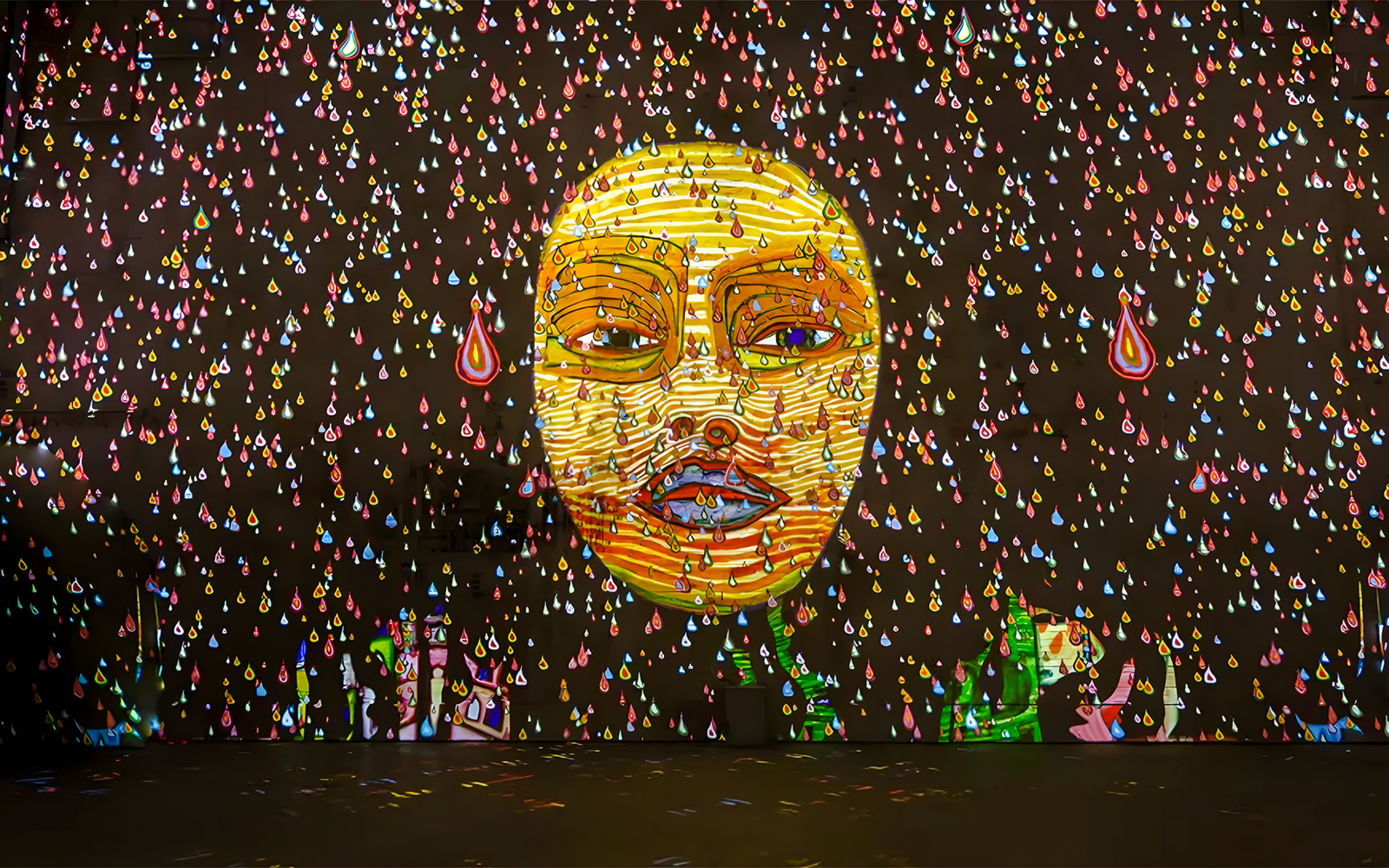 Hundertwasser artwork projection with colorful drops at Port des Lumières, Hamburg.